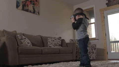 Young kid rides virtual reality roller coaster  Stock Footage 85365876