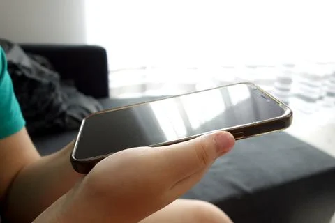 Young kid using digital device Stock Photos
