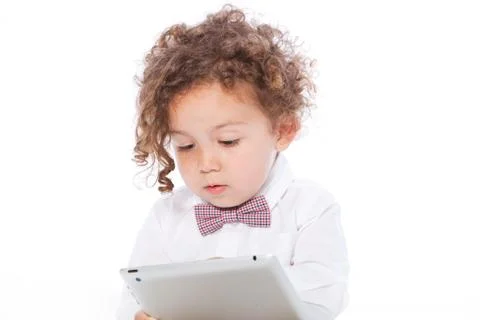 Young kid using tablet Stock Photos