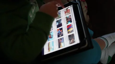 Young kid using youtube in Ipad Stock Footage 45443877