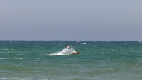 Young Kitesurfer Edging Over Surf At Kiteboarding Event Stock Footage 111303396