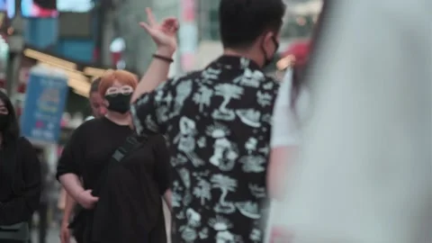 Young Koreans walking in Hongdae during Covid-19 Stock Footage 137435342