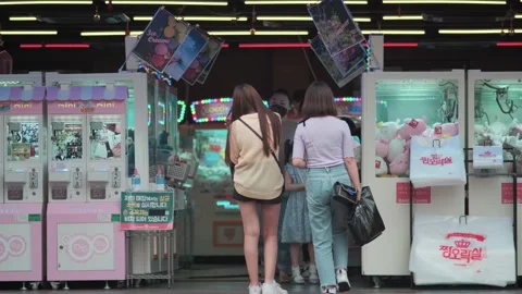 Young Koreans walking in Hongdae during Covid-19 Stock Footage 137436048