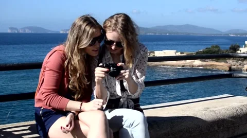 Young ladies with camera 스톡 동영상 43385905