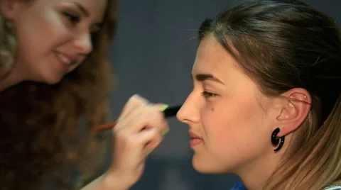 Young lady been applied with make up Video stock 54029745