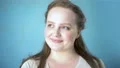 Young lady on blue background, dreams and inspiration, pleasant memories, beauty 4k or 4k+ Resolution