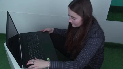 Young lady with a computer problem Stock Footage 61074345