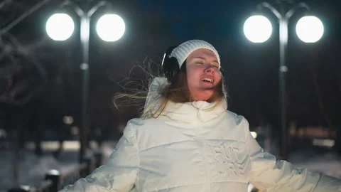 Young Lady Dancing Under Night Streetlights Stock Footage 307458235