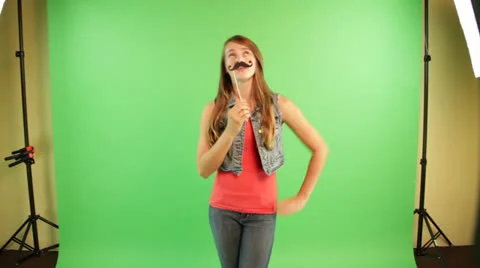 Young Lady is making fun with the mask Stock Footage 22905713