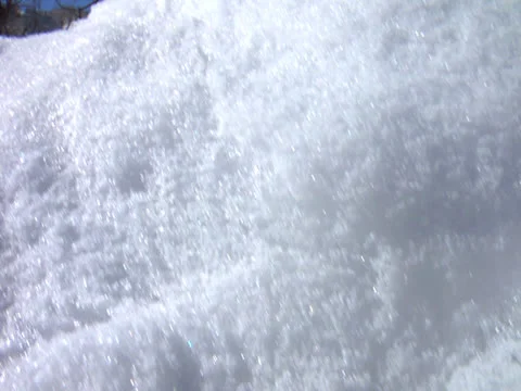 A young Lady play by throwing the snowfall with someone Stock Footage 23104108