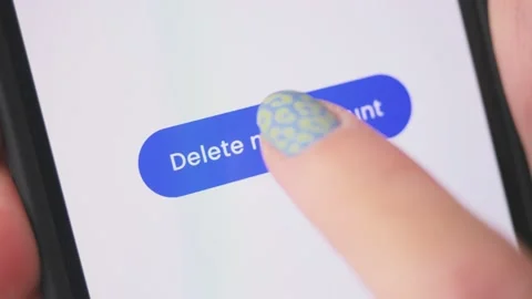Young lady pressing delete my account button on smartphone. Social media Stock Footage 210386509