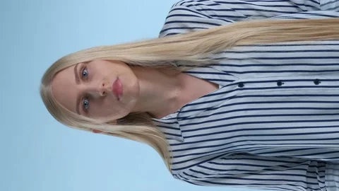 Young lady showing that she doesn't know something Stock Footage 130173618
