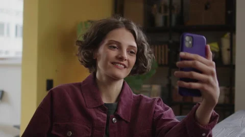 A young lady is talking with someone on the phone Stock Footage 170203437
