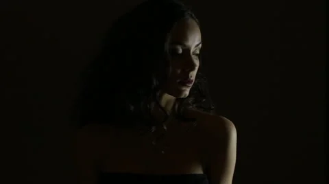 Young lady turning head to right in slow motion Stock Footage 63094980