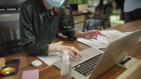 A young lady is typing something on the computer Stock Footage 160170645
