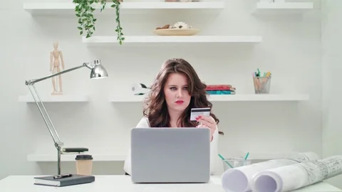 A Young Lady Using a Computer Indoors Stock Footage 83750033