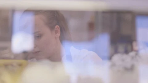 Young Lady Working at Bakery | Cinematic 60P Vídeo Stock 129387957