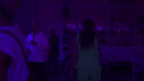 Young Latina dancing enjoying a high-energy party at Da Maria lounge, 4K Vídeos de archivo 329226484