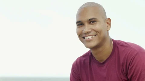 Young latino man smiling at camera Stock Footage 4785649