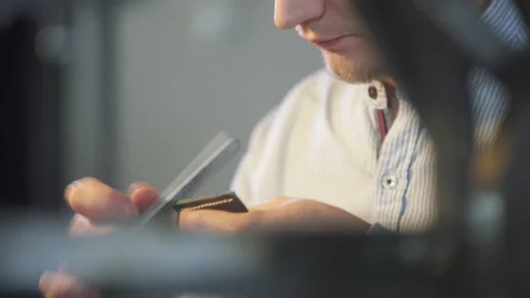 Young leather craftsman creates a DIY product. Handicraft hobby. Close Up Stock-Footage 130214978