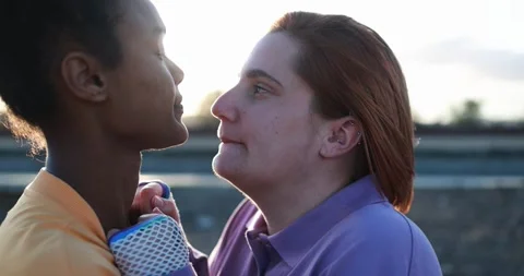 Young lesbian couple having tender moment together outdoor 動画素材 170604547
