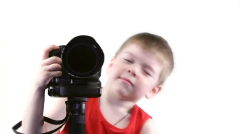 Young little boy with the camera Stock Footage 37620884