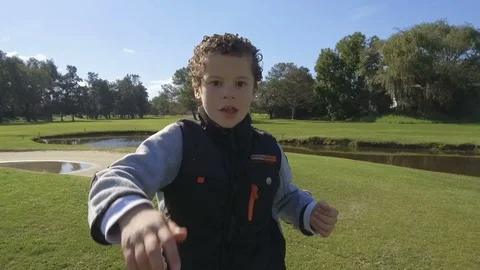 Young little Boy Running - Dancing outdoors park. Slow Motion Video stock 90730755