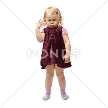 Young little girl standing over isolated white background Stock Photos