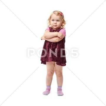 Young little girl standing over isolated white background Stock Photos