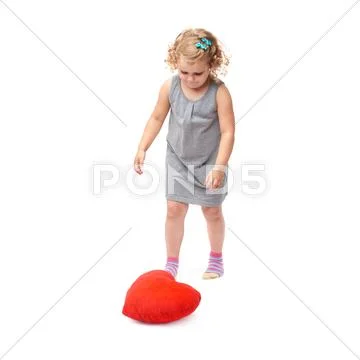 Young little girl standing over isolated white background Stock Photos