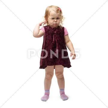 Young little girl standing over isolated white background Stock Photos