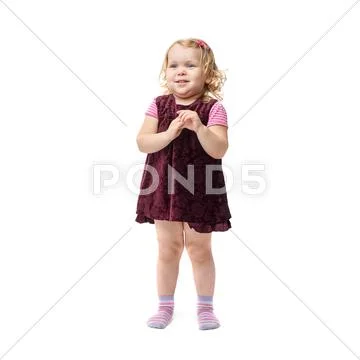 Young little girl standing over isolated white background Stock Photos