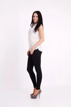 Young long-haired black-haired woman Stock Photos