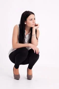 Young long-haired black-haired woman Stock Photos