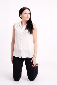 Young long-haired black-haired woman Stock Photos