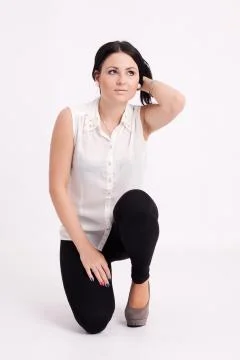 Young long-haired black-haired woman Stock Photos