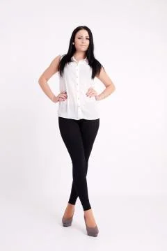 Young long-haired black-haired woman Stock Photos