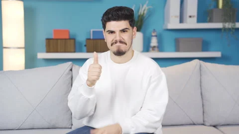 Young looking at the camera congratulates with applause. Stock Footage 236218956