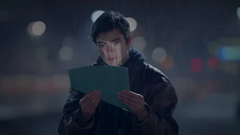 Young Lost Man with Suitcase Finding Broken Mirror on Urban Street at Night Stock Footage 270978297