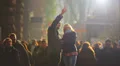 The young lovers above the people crowd, silhouettes-like, REAL TIME HD Footage
