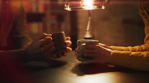 Young loving couple drinking tea and talking during romantic coffee shop date Stock Footage 340266969