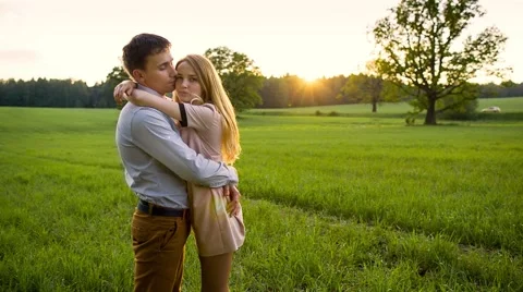 Young loving couple embracing Stock Footage 43570176