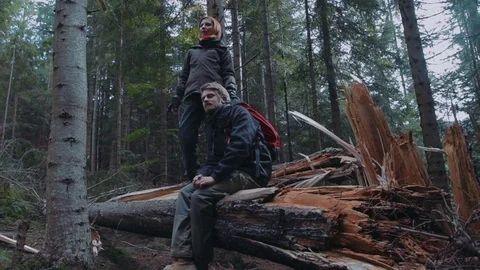 Young loving couple having fun in mountain forest Stock Footage 82829431