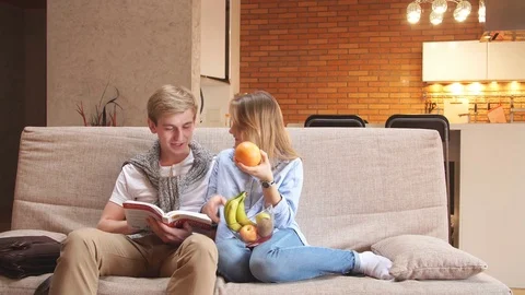 Young loving couple having fun at home. Video stock 83634499