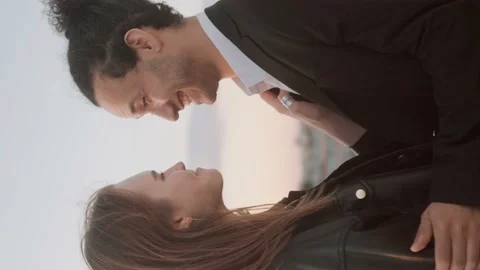 Young loving couple romantic date on the roof above the city Video stock 158156953