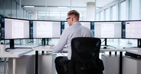 Young Male Accountant Using Essential E-invoice Software On His Computer. 스톡 사진