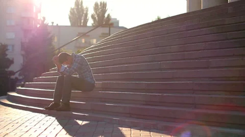 Young male broken relationships, problems, depression, stairs Stock Footage 28209124