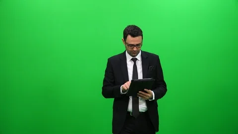 Young Male Businessman Using Tablet with Green Screen Stock Footage 88651611