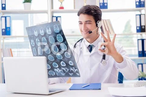 Young male doctor in telehealth concept Stock Photos