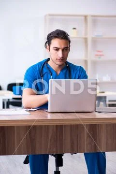 Young male doctor in telehealth concept Stock Photos